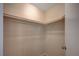 Walk-in closet featuring multiple levels of racking and a neutral color scheme at , Las Vegas, NV 89106