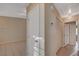 Hallway features tile flooring, closet, and a view into another room with hardwood floors, providing ample storage at , Las Vegas, NV 89106