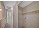 Utility room includes washer/dryer hookups, shelving, and nearby access to other rooms at , Las Vegas, NV 89106