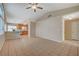 Bright and airy living room with tile floors, a ceiling fan, and a seamless transition to the adjacent kitchen at , Las Vegas, NV 89106