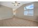 Open living room showcasing tile floors, vaulted ceiling, large windows and neutral colored walls at , Las Vegas, NV 89106