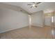 Spacious living room featuring tile flooring, high ceilings and seamless transition to the front door at , Las Vegas, NV 89106