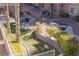 Serene outdoor area featuring picnic tables, lush greenery, and tranquil surroundings for relaxation at 10553 Pine Pointe Ave # 201, Las Vegas, NV 89144