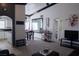 Bright living room with dining area featuring modern decor and an open floor plan at 10553 Pine Pointe Ave # 201, Las Vegas, NV 89144