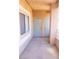 Covered patio with two storage doors and a window at 10553 Pine Pointe Ave # 201, Las Vegas, NV 89144