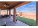 Spacious covered patio featuring cozy seating and dining area, perfect for outdoor entertaining at 10568 Pelican Island Ave, Las Vegas, NV 89166
