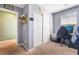 Bedroom with gray walls, closet, and a workstation with natural light coming from a window at 10568 Pelican Island Ave, Las Vegas, NV 89166