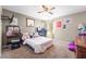 Cozy bedroom with a vanity, desk, and plush decor, creating a comfortable space at 10568 Pelican Island Ave, Las Vegas, NV 89166