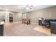 Spacious bonus room with foosball table, ceiling fan, and carpeted floors at 10568 Pelican Island Ave, Las Vegas, NV 89166