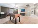 Bonus room with foosball table, television, and neutral-colored walls at 10568 Pelican Island Ave, Las Vegas, NV 89166