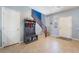 Bright foyer featuring tile flooring, coat rack with bench and staircase at 10568 Pelican Island Ave, Las Vegas, NV 89166