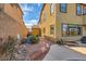 Exterior view of the backyard with an inviting pool, spa, and mature landscaping at 1178 Yellow Orchid St, Henderson, NV 89002