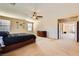 Large bedroom with ample natural light from dual windows and an attached sitting room at 1178 Yellow Orchid St, Henderson, NV 89002