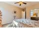 This bedroom features neutral walls, carpet floors, and a ceiling fan for added comfort at 1178 Yellow Orchid St, Henderson, NV 89002