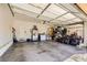 Spacious garage with ample storage space, an automatic door, and bright lighting at 1178 Yellow Orchid St, Henderson, NV 89002