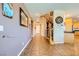 Spacious hallway with tiled floors, stairs, and access to multiple rooms at 1178 Yellow Orchid St, Henderson, NV 89002