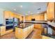 Spacious kitchen with stainless steel appliances, ample counter space, and a large island at 1178 Yellow Orchid St, Henderson, NV 89002