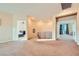 This large living room boasts carpet floors, neutral walls, recessed lights, and wrought iron railing at 1178 Yellow Orchid St, Henderson, NV 89002