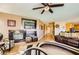 Cozy living room with fireplace, tile floors, and open layout at 1178 Yellow Orchid St, Henderson, NV 89002