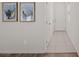 Bright entryway features neutral paint, tile flooring and artwork at 12521 Lylan Ridge St, Las Vegas, NV 89138