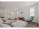 Comfortable living room with wood floors, stylish furniture, neutral paint, and plenty of light at 12521 Lylan Ridge St, Las Vegas, NV 89138