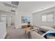 Bright living room area with neutral decor and a comfortable seating arrangement at 12521 Lylan Ridge St, Las Vegas, NV 89138
