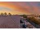 Rooftop patio with outdoor furniture offering panoramic views of the city at sunset at 1436 Via Merano St, Henderson, NV 89052