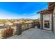 Balcony with iron railing that offers stunning neighborhood and mountain views at 1436 Via Merano St, Henderson, NV 89052