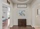 Inviting entryway with stylish decor and hardwood floors showcasing an arched entry to the living area at 1436 Via Merano St, Henderson, NV 89052