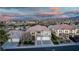 Beautiful two-story home with a large three-car garage and a well-manicured front yard with nice landscaping at 1436 Via Merano St, Henderson, NV 89052