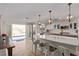 Beautiful kitchen featuring stainless steel appliances, double islands, and backyard views at 1436 Via Merano St, Henderson, NV 89052