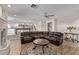 Spacious living room that has an open floorplan connecting to the kitchen and backyard at 1436 Via Merano St, Henderson, NV 89052