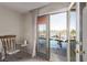 Patio with a stunning view of the pool and neighborhood beyond at 1436 Via Merano St, Henderson, NV 89052