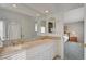 Bathroom featuring double sinks, granite counters, and access to the bedroom at 208 Stonewood, Las Vegas, NV 89107