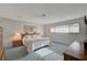 Bedroom features carpeted floors, soft lighting, and floral wallpaper at 208 Stonewood, Las Vegas, NV 89107