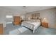 Bright bedroom has carpeted floors, soft lighting, a large window, and floral wallpaper at 208 Stonewood, Las Vegas, NV 89107