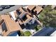 This aerial view shows the house, backyard and solar panels of this home at 2108 Running River Rd, Henderson, NV 89074