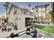 Backyard of house featuring a patio, lawn, landscaping, and a swimming pool at 2508 Monarch Bay Dr, Las Vegas, NV 89128