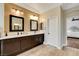 Bathroom features a double vanity with a view into the bedroom at 2508 Monarch Bay Dr, Las Vegas, NV 89128