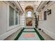 Charming entryway with an ornate door and manicured landscaping at 2508 Monarch Bay Dr, Las Vegas, NV 89128