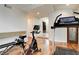 Exercise room with fitness equipment, recessed lighting, and view into the living room at 2508 Monarch Bay Dr, Las Vegas, NV 89128