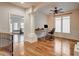 Home office with hardwood floors, a large desk, and natural light from the windows at 2508 Monarch Bay Dr, Las Vegas, NV 89128