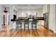 Kitchen with granite countertops, stainless steel appliances, and breakfast bar with seating at 2508 Monarch Bay Dr, Las Vegas, NV 89128