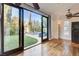 Inviting living room boasting sliding doors to a beautifully landscaped backyard and patio at 2508 Monarch Bay Dr, Las Vegas, NV 89128
