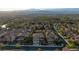 A densely populated neighborhood is seen from above, showcasing rows of houses and the surrounding landscape at 2737 Josephine Dr, Henderson, NV 89044