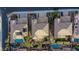 An aerial shot shows a neatly organized suburban neighborhood with houses featuring well-maintained yards and nearby amenities at 2737 Josephine Dr, Henderson, NV 89044