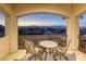 Cozy balcony seating area with beautiful views of the city skyline at 2737 Josephine Dr, Henderson, NV 89044