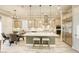 Modern kitchen with stainless steel appliances, a large island with seating, and a breakfast nook at 2737 Josephine Dr, Henderson, NV 89044