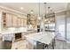 Spacious kitchen with a large island, stainless steel appliances, and custom cabinets at 2737 Josephine Dr, Henderson, NV 89044