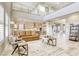 Open-concept living room with high ceilings, large windows, and a view into the modern kitchen at 2737 Josephine Dr, Henderson, NV 89044